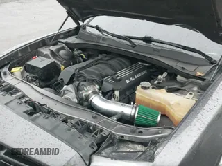 2014 Dodge Charger SRT-8 с VIN 2C3CDXEJ0EH250650, выставлен на аукционе IAAI как лот 41486045 с пробегом 122 018 миль миль и . История ставок и продаж доступна на DreamBid. Изображение 19.