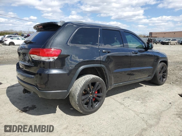 2014 Jeep Grand Cherokee Limited with VIN 1C4RJFBG1EC482159, listed as a Copart auction lot 52017095 with 86,471 mi miles and Salvage Title. Bid and sale history available at DreamBid. Image 3.