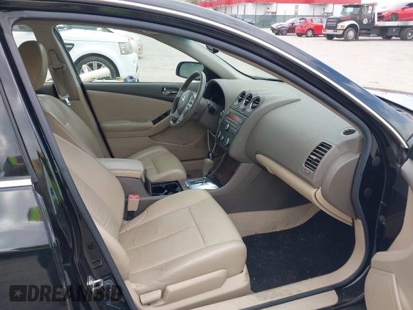 2011 Nissan Altima 2.5 S with VIN 1N4AL2AP7BC143909, listed as a IAAI auction lot 42042177 with 179,802 mi miles. Bid and sale history available at carsss.com. Image 5.