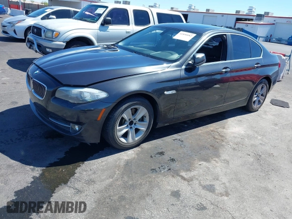 2013 BMW 5 Series 528i with VIN WBAXG5C58DD232582, listed as a IAAI auction lot 41890082 with 150,401 mi miles and . Bid and sale history available at carsss.com. Image 2.