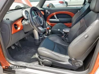2007 MINI Convertible S with VIN WMWRH33547TJ43144, listed as a Copart auction lot 65440545 with 88,073 mi miles and Salvage title. Bid and sale history available at DreamBid. Image 7.