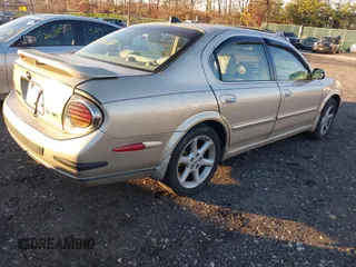 2003 Nissan Maxima SE z VIN JN1DA31D83T502519, wystawiony jako IAAI lot #41104746 z przebiegiem Nie podano mil oraz . Historia ofert i sprzedaży dostępna na DreamBid. Obrazek 4.