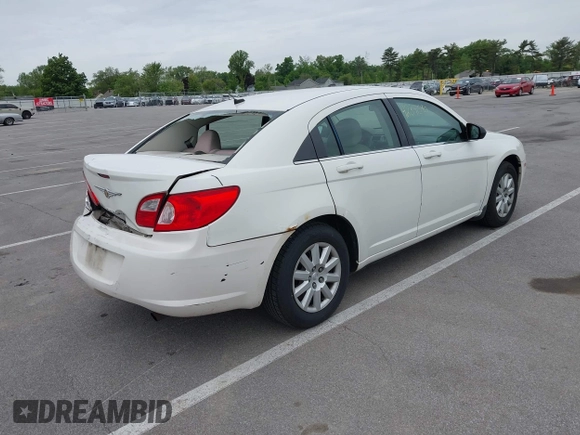 2008 Chrysler Sebring LX with VIN 1C3LC46K28N133141, listed as a IAAI auction lot 42341590 with 140,668 mi miles and . Bid and sale history available at DreamBid. Image 4.