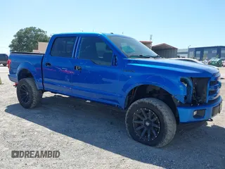 2015 Ford F-150 XLT z VIN 1FTEW1EG7FFC58795, wystawiony jako IAAI lot #42704911 z przebiegiem 98 012 mil mil oraz . Historia ofert i sprzedaży dostępna na DreamBid. Obrazek 1.