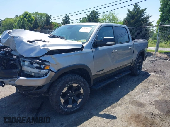 2019 Ram 1500 Rebel with VIN 1C6SRFLT8KN797618, listed as a IAAI auction lot 42556663 with 92,606 mi miles and . Bid and sale history available at DreamBid. Image 17.
