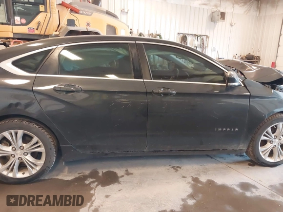 2014 Chevrolet Impala LT z VIN 2G1115SL8E9253725, wystawiony jako IAAI lot #42125365 z przebiegiem 162 486 mil mil oraz . Historia ofert i sprzedaży dostępna na DreamBid. Obrazek 13.