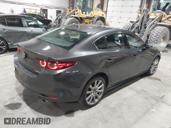 2020 Mazda 3 Premium with VIN 3MZBPBEM3LM123091, listed as a IAAI auction lot 41568213 with 68,515 mi miles and . Bid and sale history available at DreamBid. Image 4.