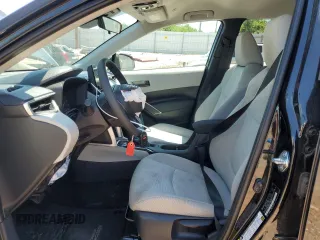 2023 Toyota Corolla Cross LE with VIN 7MUCAAAG3PV058094, listed as a Copart auction lot 57983105 with 30,593 mi miles and Salvage title. Bid and sale history available at DreamBid. Image 7.