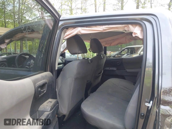 2022 Toyota Tacoma SR with VIN 3TYAX5GN1NT042099, listed as a IAAI auction lot 42081791 with 38,621 mi miles and . Bid and sale history available at DreamBid. Image 8.