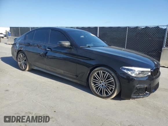 2018 BMW 5 Series M550i xDrive with VIN WBAJB9C52JB035913, listed as a Copart auction lot 51441195 with 42,205 mi miles and Salvage Title. Bid and sale history available at carsss.com. Image 4.