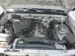 2002 Nissan Frontier XE with VIN 1N6DD26S42C334251, listed as a Copart auction lot 49308145 with 202,805 mi miles and Salvage title. Bid and sale history available at DreamBid. Image 11.
