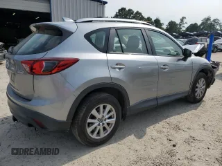 2015 Mazda CX-5 Sport with VIN JM3KE2BE4F0533273, listed as a Copart auction lot 60307795 with 120,484 mi miles and Salvage title. Bid and sale history available at DreamBid. Image 3.