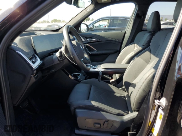2023 BMW X1 xDrive28i with VIN WBX73EF05P5W78138, listed as a Copart auction lot 62868065 with 12,534 mi miles and Salvage title. Bid and sale history available at DreamBid. Image 7.