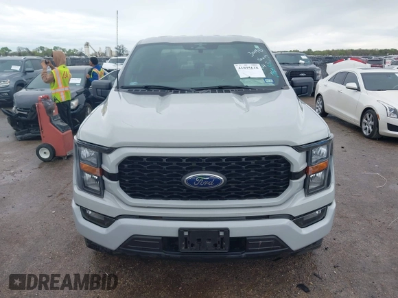 2023 Ford F-150 XL with VIN 1FTEW1CP8PKD21690, listed as a IAAI auction lot 41895618 with 15,078 mi miles and . Bid and sale history available at DreamBid. Image 13.