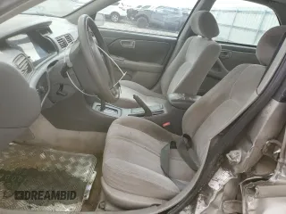 2000 Toyota Camry CE with VIN JT2BG22K6Y0471945, listed as a Copart auction lot 48932715 with Not Provided miles and Salvage Title. Bid and sale history available at DreamBid. Image 7.