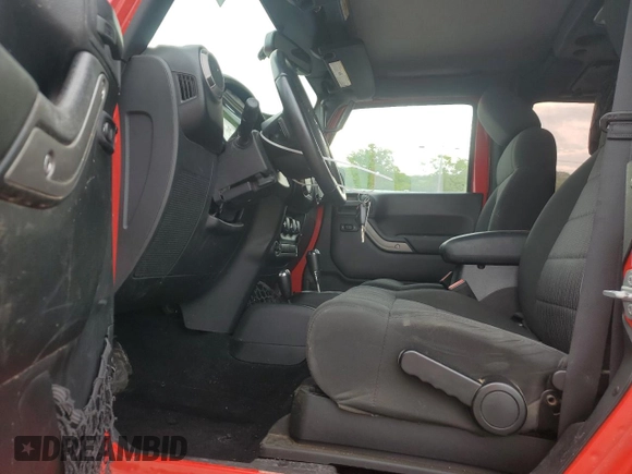 2015 Jeep Wrangler Sport with VIN 1C4AJWAG6FL715453, listed as a Copart auction lot 53686145 with 88,504 mi miles and Salvage Title. Bid and sale history available at DreamBid. Image 7.