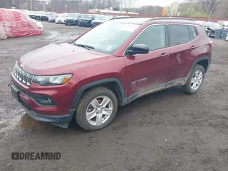 2022 Jeep Compass Latitude with VIN 3C4NJDBB7NT206323, listed as a IAAI auction lot 42038930 with 84,976 mi miles and . Bid and sale history available at DreamBid. Image 2.