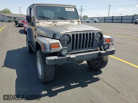 2003 Jeep Wrangler Sport z VIN 1J4FA49S43P327283, wystawiony jako Copart lot #59036295 z przebiegiem 158 108 mil mil oraz Szkoda całkowita • Salvage title. Historia ofert i sprzedaży dostępna na DreamBid. Obrazek 13.