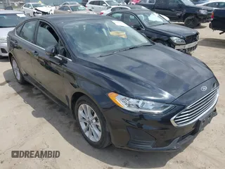 2020 Ford Fusion SE z VIN 3FA6P0LU7LR170922, wystawiony jako IAAI lot #42121025 z przebiegiem 115 799 mil mil oraz . Historia ofert i sprzedaży dostępna na DreamBid. Obrazek 1.