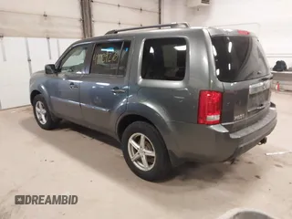2011 Honda Pilot EX-L with VIN 5FNYF4H55BB039079, listed as a IAAI auction lot 42029278 with 173,216 mi miles. Bid and sale history available at carsss.com. Image 3.
