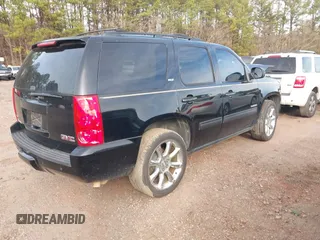 2012 GMC Yukon SLT with VIN 1GKS1CE06CR104447, listed as a IAAI auction lot 41589823 with 183,003 mi miles. Bid and sale history available at carsss.com. Image 4.