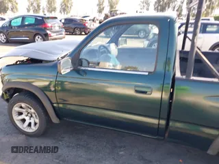 1999 Toyota Tacoma with VIN 4TANL42N7XZ481489, listed as a IAAI auction lot 40365153 with 218,971 mi miles. Bid and sale history available at carsss.com. Image 14.