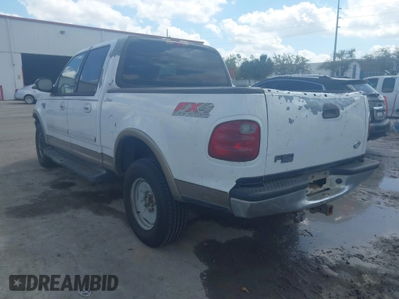 2002 Ford F-150 XLT with VIN 1FTRW08L02KA10457, listed as a IAAI auction lot 41704625 with 151,072 mi miles. Bid and sale history available at carsss.com. Image 3.