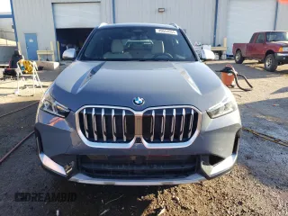 2024 BMW X1 xDrive28i with VIN WBX73EF00R5Z58004, listed as a Copart auction lot 49554055 with 4,053 mi miles and Salvage title. Bid and sale history available at DreamBid. Image 5.