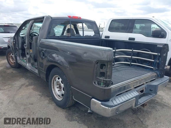 2005 Ford F-150 XLT with VIN 1FTPW12575KB99409, listed as a IAAI auction lot 41711304 with 1 mi miles. Bid and sale history available at carsss.com. Image 3.