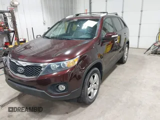 2012 Kia Sorento EX with VIN 5XYKU3A60CG254775, listed as a IAAI auction lot 42638220 with 49,000 mi miles and . Bid and sale history available at DreamBid. Image 2.