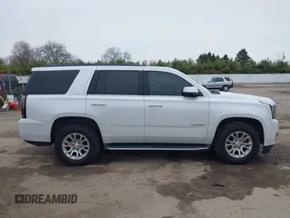 2016 GMC Yukon SLT with VIN 1GKS2BKC5GR374815, listed as a IAAI auction lot 41889495 with 163,464 mi miles. Bid and sale history available at carsss.com. Image 14.