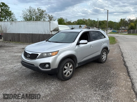 2012 Kia Sorento LX with VIN 5XYKT3A65CG211116, listed as a Copart auction lot 54499445 with 121,173 mi miles and Clean Title. Bid and sale history available at carsss.com. Image 2.