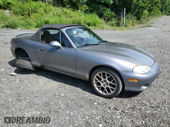 2002 Mazda MX-5 Miata Cloth z VIN JM1NB353520224582, wystawiony jako Copart lot #63669835 z przebiegiem 88 455 mil mil oraz Szkoda całkowita • Salvage title. Historia ofert i sprzedaży dostępna na DreamBid. Obrazek 4.