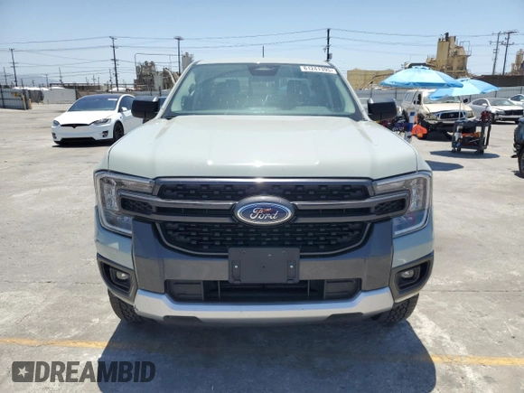 2024 Ford Ranger XLT z VIN 1FTER4GH3RLE06218, wystawiony jako Copart lot #61241395 z przebiegiem 11 739 mil mil oraz Szkoda całkowita • Salvage title. Historia ofert i sprzedaży dostępna na DreamBid. Obrazek 5.