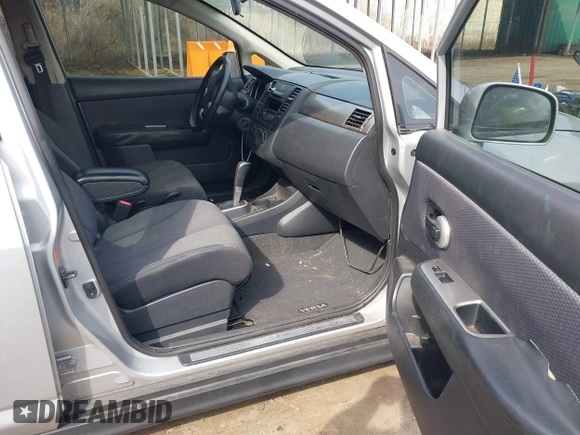 2009 Nissan Versa SL with VIN 3N1BC13E19L418874, listed as a IAAI auction lot 41698587 with 154,568 mi miles and . Bid and sale history available at DreamBid. Image 5.