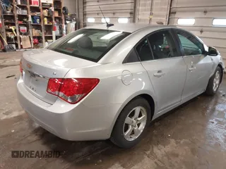 2013 Chevrolet Cruze 1LT with VIN 1G1PC5SB6D7314923, listed as a IAAI auction lot 42071232 with 105,918 mi miles and . Bid and sale history available at DreamBid. Image 4.