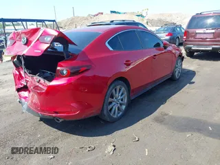 2022 Mazda 3 Select with VIN 3MZBPABLXNM315231, listed as a IAAI auction lot 42522045 with 17,486 mi miles and . Bid and sale history available at DreamBid. Image 4.