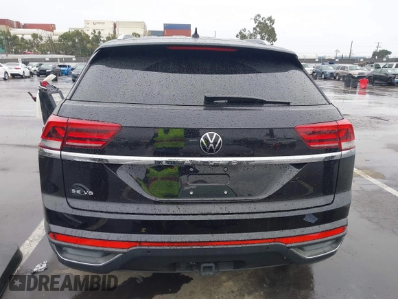 2022 Volkswagen Atlas SE z VIN 1V2WE2CA3NC203707, wystawiony jako IAAI lot #41720912 z przebiegiem 50 572 mil mil oraz . Historia ofert i sprzedaży dostępna na DreamBid. Obrazek 17.