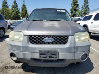 2005 Ford Escape XLT z VIN 1FMYU03155KB11291, wystawiony jako Copart lot #52246495 z przebiegiem Nie podano mil oraz Szkoda całkowita • Salvage title. Historia ofert i sprzedaży dostępna na DreamBid. Obrazek 5.
