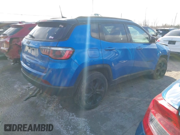2018 Jeep Compass Latitude with VIN 3C4NJDBB6JT321036, listed as a IAAI auction lot 41036531 with 147,329 mi miles. Bid and sale history available at carsss.com. Image 4.