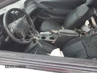 2001 Ford Mustang Standard с VIN 1FAFP40491F221228, выставлен на аукционе Copart как лот 56881495 с пробегом Не указан миль и Списание • Salvage title. История ставок и продаж доступна на DreamBid. Изображение 7.