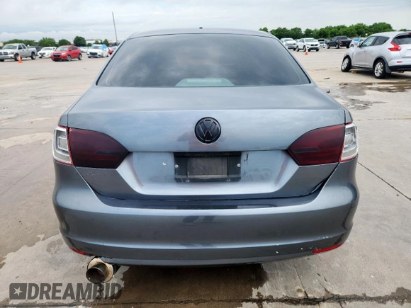 2014 Volkswagen Jetta S with VIN 3VW2K7AJ4EM226580, listed as a Copart auction lot 58539055 with 138,927 mi miles and Salvage title. Bid and sale history available at DreamBid. Image 6.