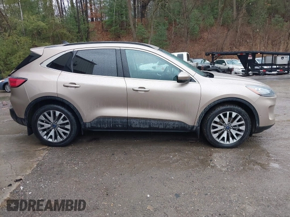 2021 Ford Escape Titanium Hybrid with VIN 1FMCU9DZXMUA66161, listed as a IAAI auction lot 41208651 with 61,198 mi miles and . Bid and sale history available at DreamBid. Image 13.