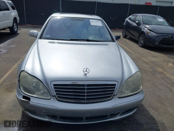 2003 Mercedes-Benz S-Class 4.3L with VIN WDBNG70J23A317424, listed as a IAAI auction lot 41716056 with 175,616 mi miles. Bid and sale history available at carsss.com. Image 12.