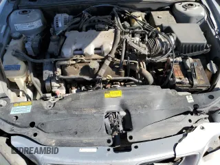1999 Pontiac Grand Am SE2 with VIN 1G2NE52E5XM826878, listed as a Copart auction lot 77351164 with 241,463 mi miles and Salvage Title. Bid and sale history available at carsss.com. Image 11.