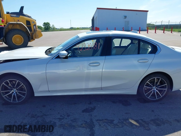 2021 BMW 3 Series 330i xDrive with VIN WBA5R7C0XMFK54525, listed as a IAAI auction lot 42320181 with 54,576 mi miles and . Bid and sale history available at DreamBid. Image 14.