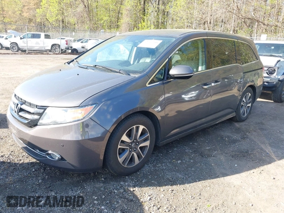 2015 Honda Odyssey Touring Elite with VIN 5FNRL5H99FB094727, listed as a IAAI auction lot 42001288 with 254,015 mi miles and . Bid and sale history available at DreamBid. Image 23.