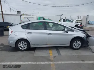 2012 Toyota Prius Plug-In with VIN JTDKN3DP3C3012519, listed as a IAAI auction lot 41874632 with 144,777 mi miles. Bid and sale history available at carsss.com. Image 14.
