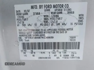 2007 Ford F-150 STX with VIN 1FTRX14W87KC40659, listed as a IAAI auction lot 41423345 with 145,811 mi miles. Bid and sale history available at carsss.com. Image 9.
