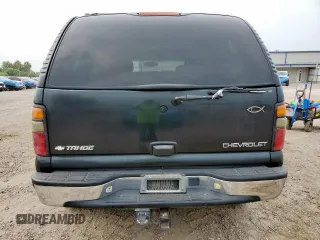 2004 Chevrolet Tahoe LT z VIN 1GNEC13Z84J171857, wystawiony jako Copart lot #57993315 z przebiegiem 239 893 mil mil oraz Szkoda całkowita • Salvage title. Historia ofert i sprzedaży dostępna na DreamBid. Obrazek 6.